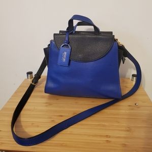 Kate Spade Saturday blue and black handbag. Gold colored hardware.Good condition